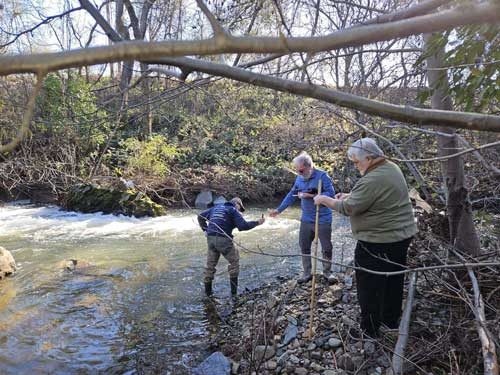 Volunteers taking measurements in Auburn Ravine